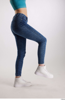 Rada  1 blue jeans casual dressed flexing leg side…